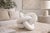 This sculptural marble knot features an elegant interlocking form with smooth, rounded contours and a timeless organic...