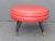 With its sweet, macaron-like shape, we think this darling, Mid-century, red, round, swivel ottoman is good enough to eat!...