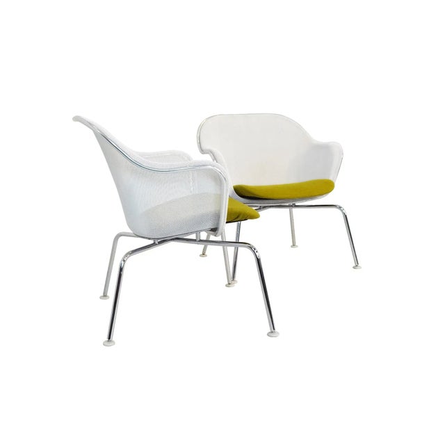 This pair of white metal mesh and fabric Luta side chairs was designed by Antonio Citterio for B&B Italia. The Luta...