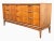 A beautifully restored Mid-Century Modern dresser showcasing the timeless appeal of Danish Modern design. Crafted in...