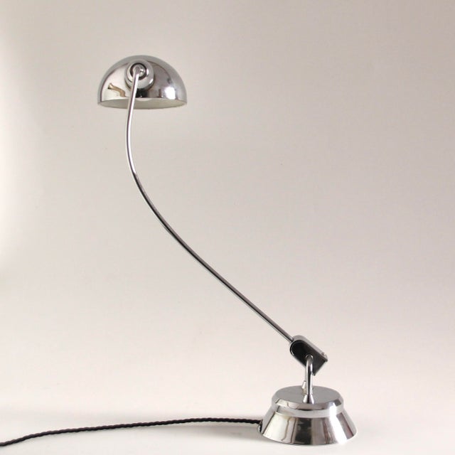 This vintage desk lamp was designed by Charlotte Perriand between 1920 and 1949 in France. It is larger as the usual...