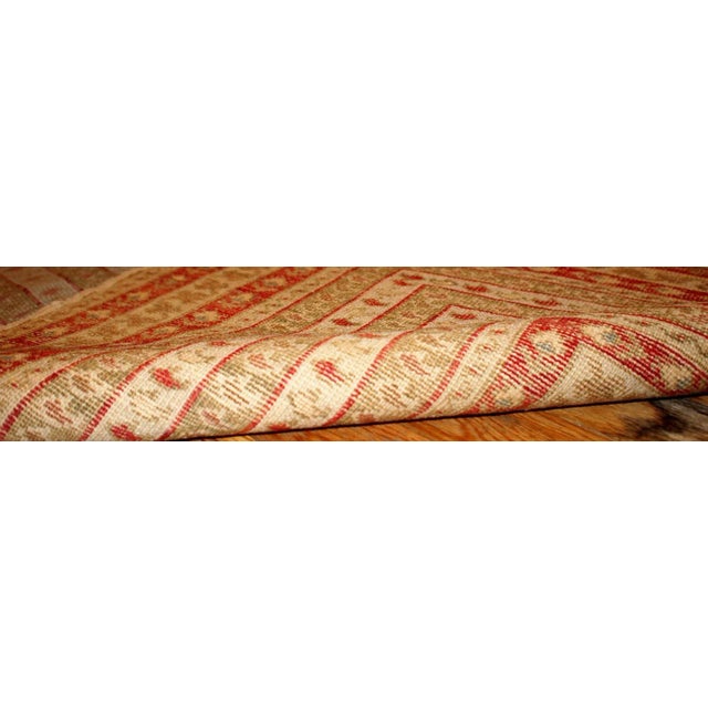 Antique collectible prayer Turkish Ghurdes rug in distressed condition. The rug is in olive green colour and lots of...