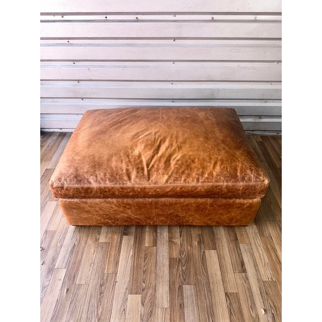This is a beautiful Restoration Hardware ENGLISH CLASSIC ROLL ARM LEATHER OTTOMAN in Chestnut Italian Berkshire leather —...