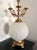 1960s Hollywood Regency candelabra table lamp featuring a striking blend of neoclassical elegance and dramatic mid-century...