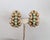 1950s goldtone ribbed beads with a line of speckled faux-topaz beads down the center clip earrings. Marked "NAPIER PAT....