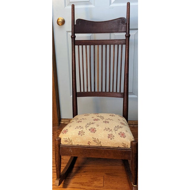 E.W. Gordon nursing chair. This chair is from the late 1800s and is very unique. It is high back and very low seat was...