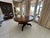 A documented French carved oak extension dining table in the Louis XIII hunting style, circa 1860, accompanied by the...