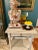 Gracefully twisted legs on this beautiful old side table make this piece perfect for almost anywhere. Great place to...