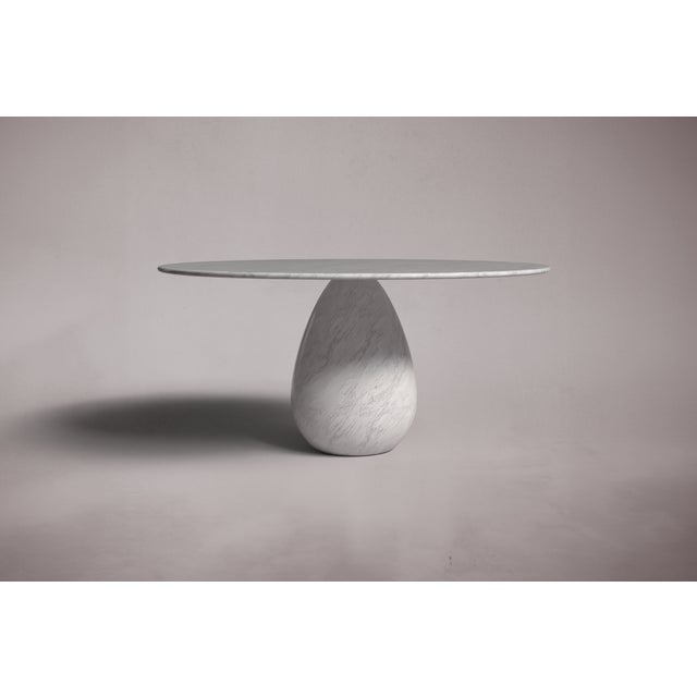 Crafted and hand-finished from solid blocks of Italian Carrara Marble, each piece exhibits the inherent variations in...