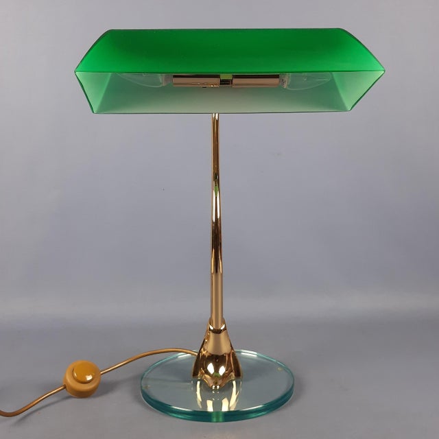 We offer for sale a design object of rare elegance, a vintage table lamp (1970s) that represents a luxurious Italian...