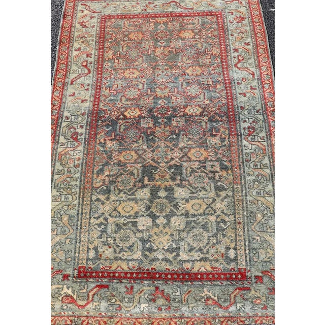 Measures: 2'8 x 4'7. Antique Persian Malayer rug with colorful geometric design in gray, blue and red. Keivan Woven Arts /...