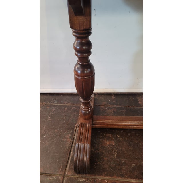 A nice Spanish Cedar Spanish Revival 1920s sofa, Library conversion to Dining Table, Table. Has a butterfly Leaf that...