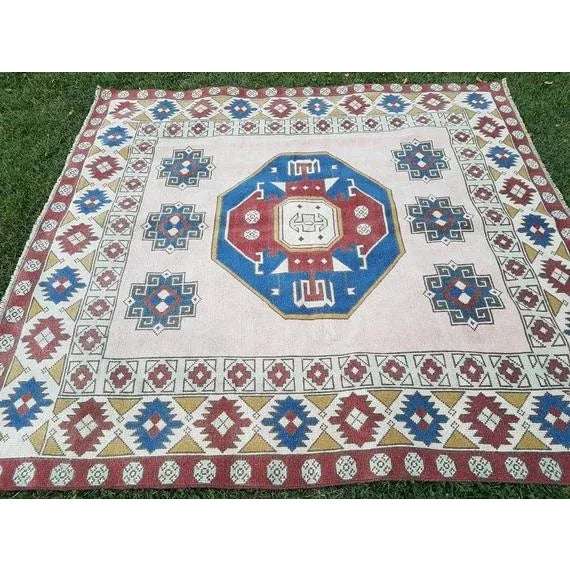 This is a vintage Turkish Oushak rug from the 1970s. Handwoven with high quality pure wool.