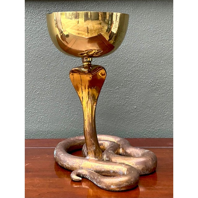 Make a bold, dramatic statement with this magnificent vintage polished brass cobra bowl. A quintessential example of...