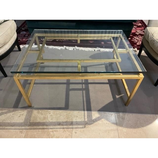 Kravet Floor Sample Brass and Glass cocktail table with glass floating on center rectangle.