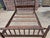 1920s period dark walnut Jenny Lind style full size spindle-type bed frame. Includes the original wooden bed rails and 5...