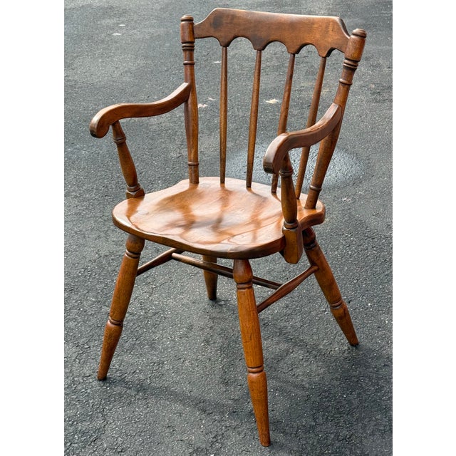 Beautiful set of 6 Windsor chairs by Cushman classics. Features fan back with arched detail , splay legs and solid maple...