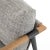 Textural grey seating of performance-grade upholstery, with angular arms of exposed oak providing fresh contrast. Slim,...