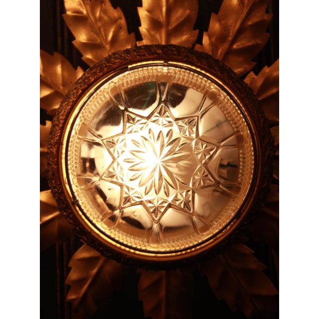 Elevate the sophistication of your spaces with this exquisite vintage mid-century / Hollywood Regency style luminaire....