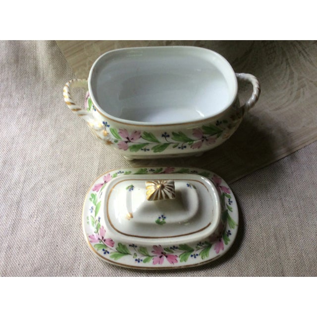 A remarkable survivor from the golden age of English porcelain! This exceptional hand-painted soft-paste porcelain tureen...