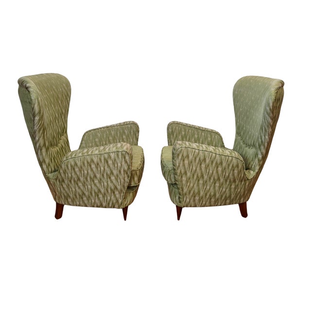 Pair of armchairs, wooden frame and legs, padded and upholstered in green fabric. Made in Italy, circa 1950. I have...