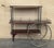 Unique mid-century bar cart in mahogany wood , brass and acrylic handle. This fantastic item was designed in Italy during...