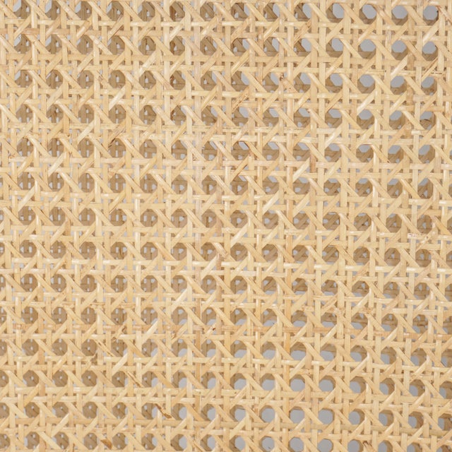 Light-toasted parawood frames a textural inlay of natural cane for a clean, monochromatic look, with seating of...