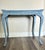 Antique carved walnut tea table. Scroll/floral carvings and cabriole legs with raised molding trim. Blue in color. Rustic...