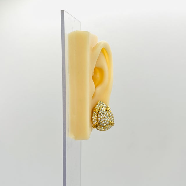 Beautiful 2.50 ct. white diamond rounds. Handmade in 18k yellow gold with lever back. These earrings can be worn two ways,...