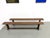 Pair of solid oak benches, made in france in the 1970s. The long, narrow top, with its pronounced grain, rests on two...