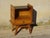 Attractive bedside table in light oak and veneer, with splayed legs. Quality craftsmanship, 1960s. Black lacquered glass...
