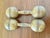 A charming pair of antique turn-of-the-century wooden dumbbells (hand weights), perfect for adding vintage warmth to...