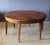 Large Louis XVI style extendable table in solid walnut, with three 50cm leaves, 305cm long when open, six legs, 61cm high...