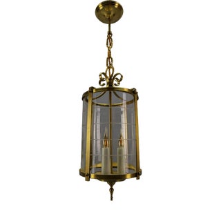 French Neoclassical Style Round Hanging Lantern in Brass and Clear Glass, 1920s For Sale
