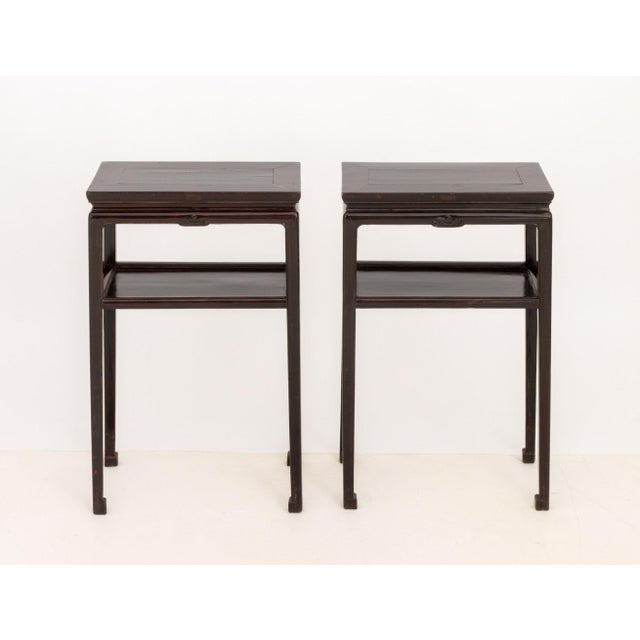 Pair of Chinese Two-Tier Pedestal Tables, lacquered wood. 32" H x 20" W x 11.5" D. Provenance: From a 1065 Park Avenue...