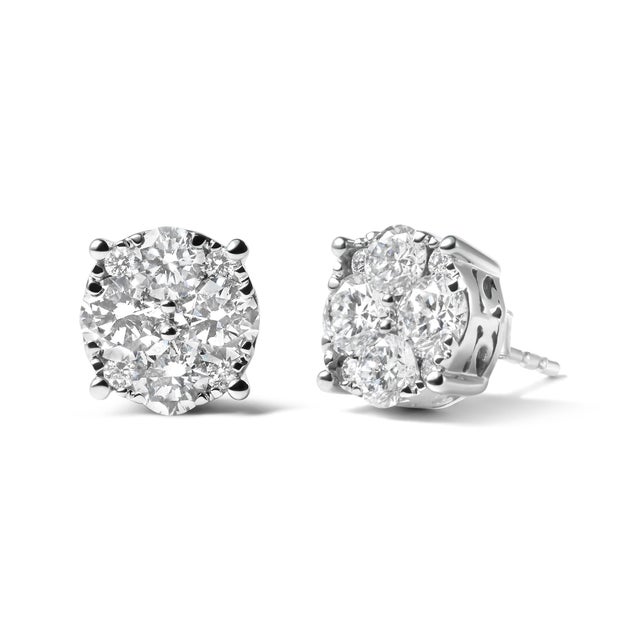 These stunning stud earrings are the perfect addition to any woman's jewelry collection. Made with 14K white gold and...