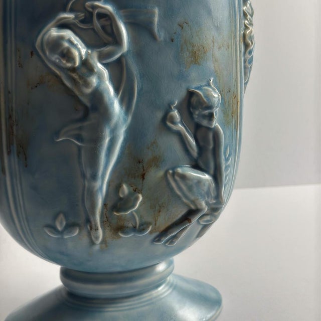 An elegant ceramic vase by Beswick, handcrafted in England during the 1930s—a period when Art Deco design explored both...