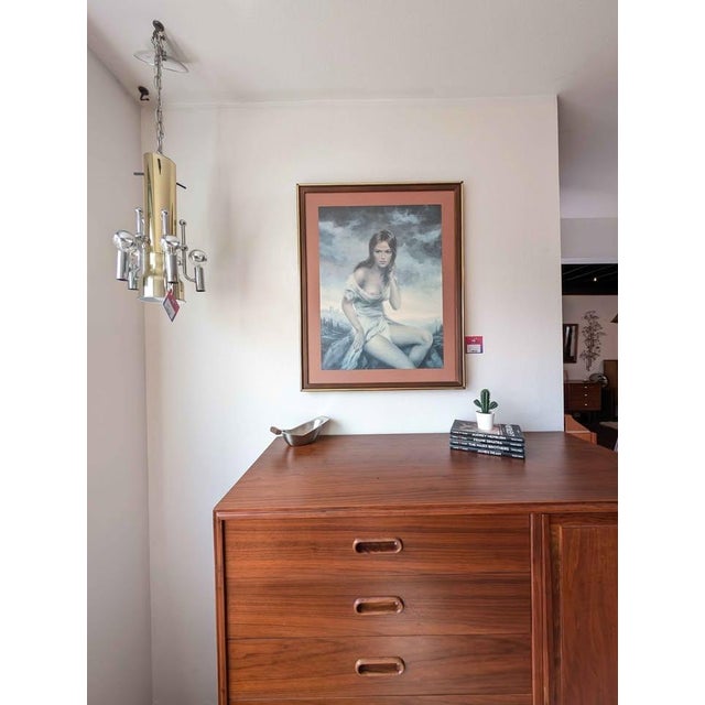 Cool mid century modern swag lamp by LA Lighting. Features a high polished brass body with chrome accents, 6 total lights...