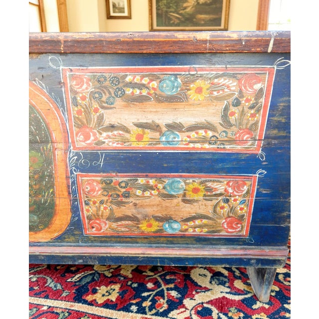 Oversized and hand painted with blues, floral motif and large bird figure in the center image. We especial like the way...