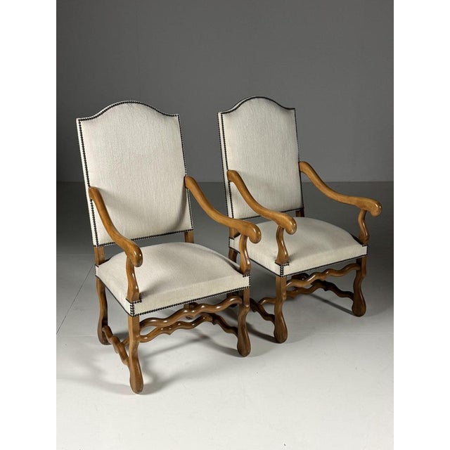 Set of 2 Os de Mouton dining room chairs. Cream white upholstery. Solid hardwood frame. Upholstery is in very good...