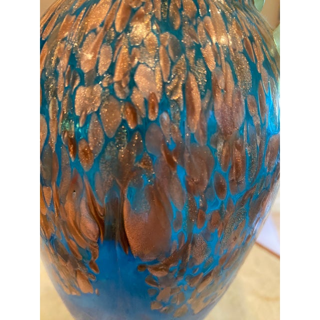 Blue, copper and green art glass vase. Age unknown