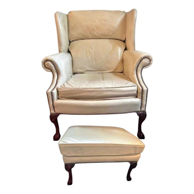 Experience Timeless Elegance With This Premium Leather Wingback Chair and Matching Ottoman Set by Classic Leather. For Sale
