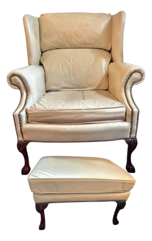 Experience Timeless Elegance With This Premium Leather Wingback Chair and Matching Ottoman Set by Classic Leather.