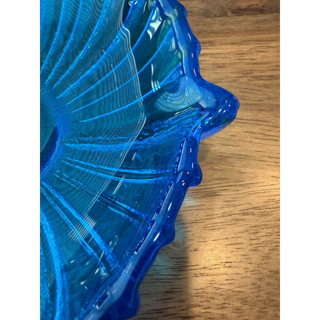 Extraordinary vibrant blue spoked rim glass bowl with a glossy inside and textured outside finish. Designed by Joel Myers...