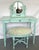 Precious vintage French style vanity with coordinating stool from the late 20th century. They have fluted legs and an oval...