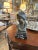 Fine bronze sculpture signed Giovanni De Martino (1870-1935) depicting a smiling peasant girl, two-stepped marble base....