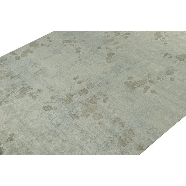 This 9x12 abstract rug is a bold new addition to Rug & Kilim’s Modern rug collection. Hand-knotted in wool and silk, its...