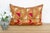 This lumbar pillow is a profound example of Museum-Grade Phulkari, repurposed from a rare 19th-century Heirloom Bagh....