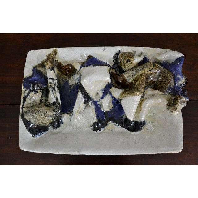 Large decorative plate made in the 60's by Jeppe Hagedorn Olsen in Denmark. The decorative plate can be hung or supported...