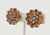 1950s goldtone faux-topaz and clear rhinestones flower clip back earrings. Marked "Kramer of NY." Measure: 1 inch across....
